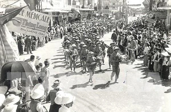 Revolutionary troops march into Hanoi to take over the capital from the French occupation forces on October 10, 1954. (File Photo)