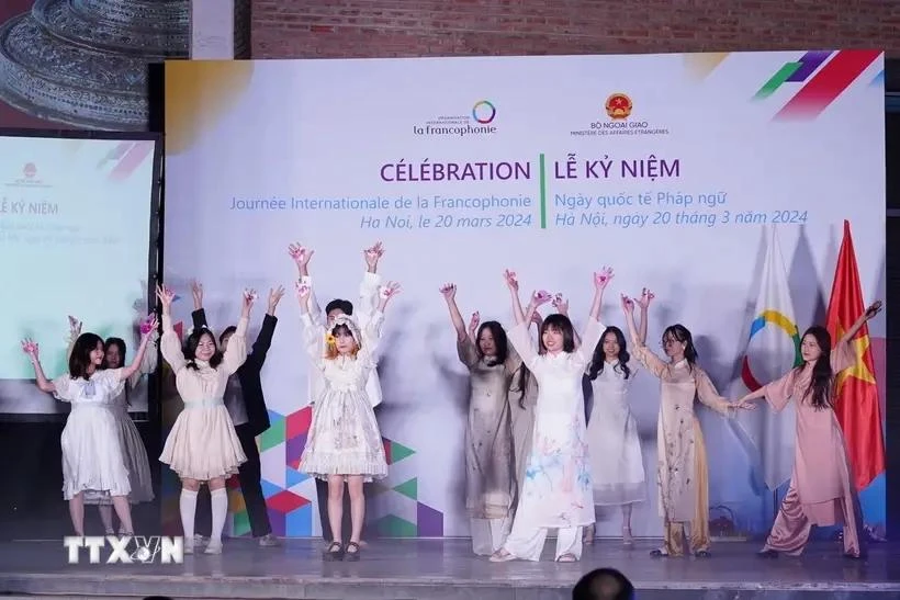 Students learning French present a cultural performance during the celebration of International Francophonie Day in Hanoi on March 20, 2024. (Photo: VNA)