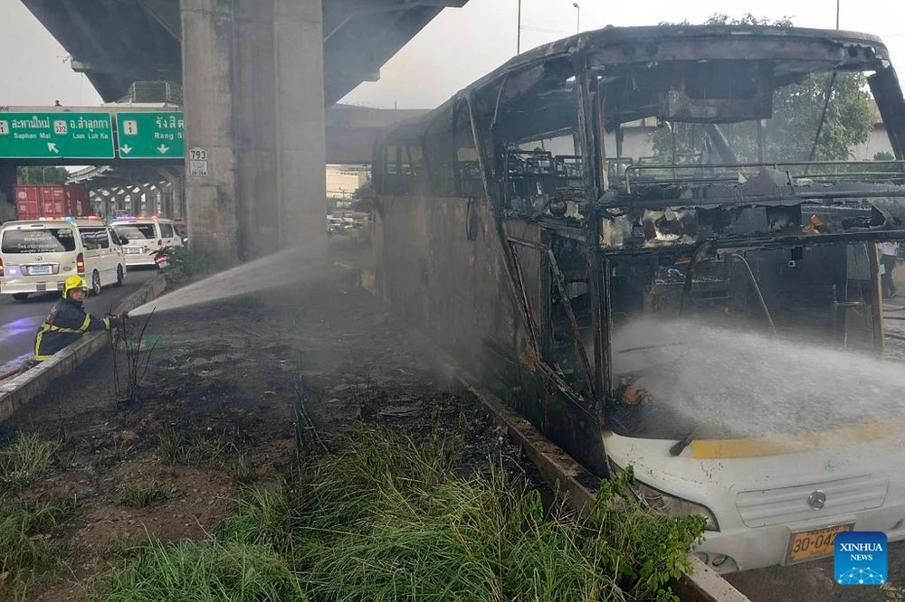 Firefighters try to extinguish the school bus fire in Bangkok, Thailand on October 1, 2024. (Photo: Xinhua)