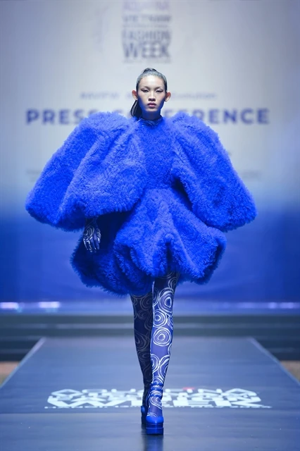 Huynh Tu Anh, winner of The Face Vietnam 2023, in a creation by designer Do Manh Cuong, who will open the AVIFW Fall/Winter 2024 with the collection called 'Giot Nuoc Thuan Khiet' (Pure Water Drop). (Photo courtesy of Multimedia JSC)