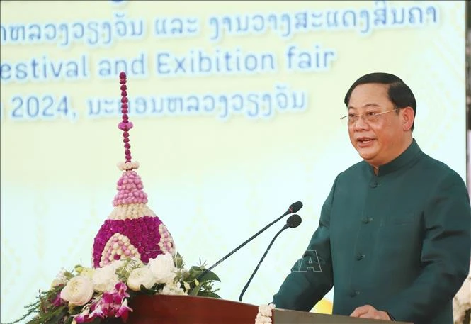 Lao Prime Minister Sonexay Siphandone speaks at the opening ceremony of The Thatluang Festival and Laos Trade Fair 2024 on November 11 in Vientiane. (Photo: VNA)