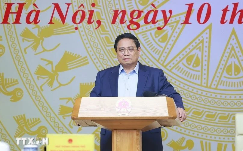 Prime Minister Pham Minh Chinh presides over the first meeting of the Central Steering Committee for for the eradication of the temporary and dilapidated houses. (Photo: VNA)