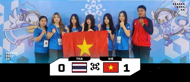 Vietnamese team pose for photo after first win at the Asian Esports Games 2024 on November 25 in Thailand. (Photo: VIRESA) 