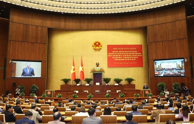 An overview of the conference, hosted by the 13th Party Central Committee’s Politburo and Secretariat, aimed to review the implementation of Resolution No 18-NQ/TW, dated October 25, 2017, of the 12th Party Central Committee. (Photo: VNA)