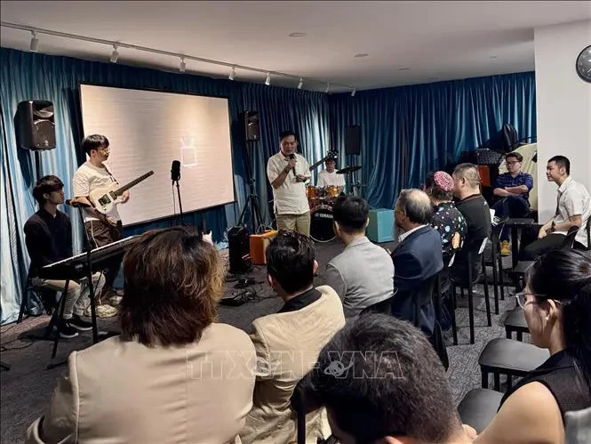 Vietnamese Ambassador to Singapore Mai Phuoc Dung speaks at the event (Photo: VNA)