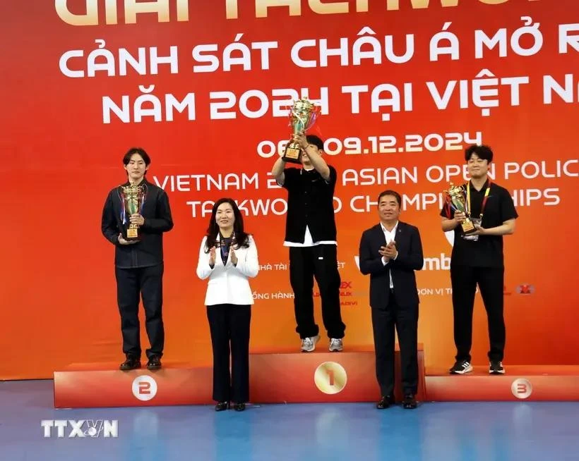 Three delegations - JeongJeom University, Shinhan University, and Daekyung University, all from the Republic of Korea – win top places in civil events at the Vietnam 2024 Asian Open Police Taekwondo Championships. (Photo: VNA)