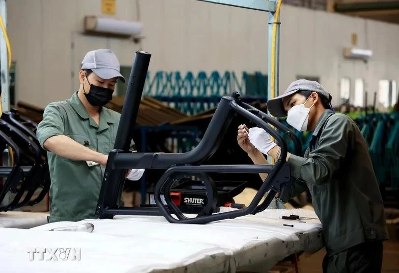 Trabajadores en el parque industrial de Giang Dien, en la provincia sureña de Dong Nai (Foto: VNA)