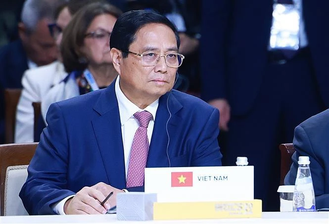 El primer ministro de Vietnam, Pham Minh Chinh, participa en la Cumbre del grupo ampliado de los BRICS (Foto: VNA)