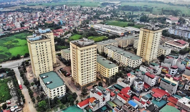 Blocs de logements sociaux à Hanoï pour les travailleurs du parc industriel de Thang Long. L’objectif est que tous les parcs industriels et zones franches d’exportation de la ville disposent de logements sociaux. (Photo : VNA)