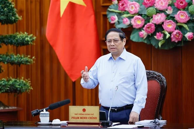 Le Premier ministre Pham Minh Chinh lors de la réunion. Photo : VNA