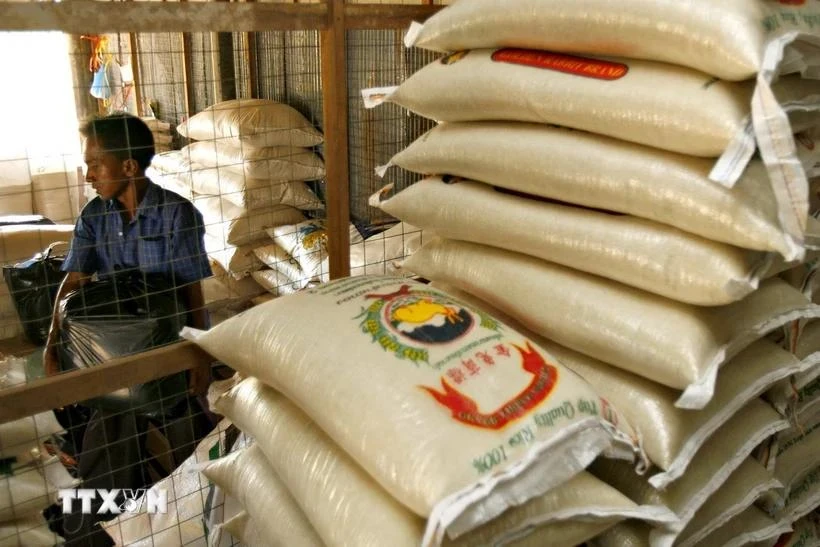 Un magasin de riz dans la ville de Pekan Mundok en Thaïlande. Photo : AFP/VNA 