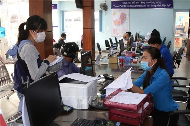 Ho Chi Minh-Ville ne facturera aucun frais pour cinq procédures administratives effectuées en ligne du 29 mai 2024 jusqu'à fin 2025. Photo: VNA