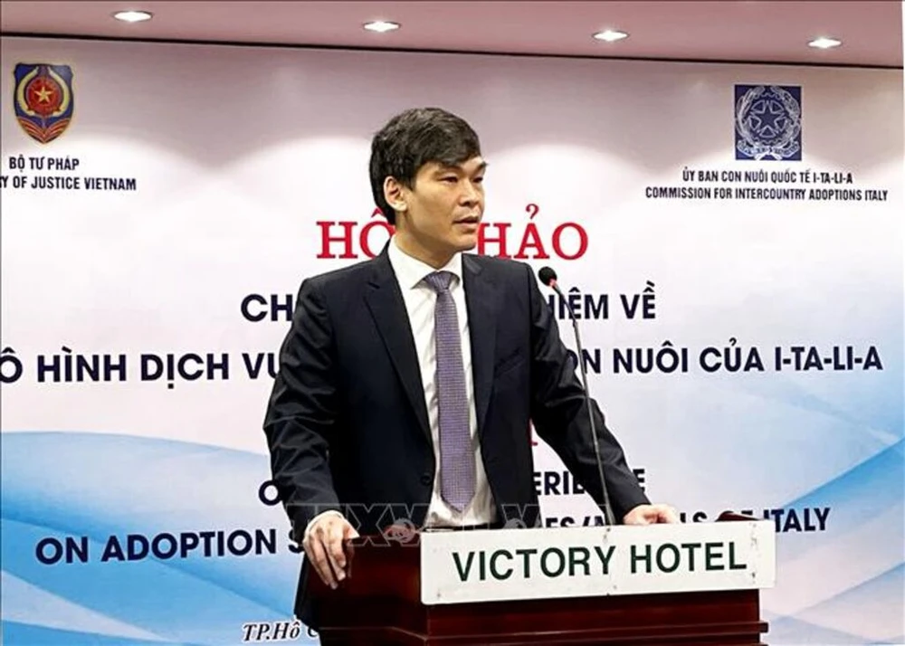 越南司法部儿童领养司司长邓陈英俊在研讨会上发言。图自越通社