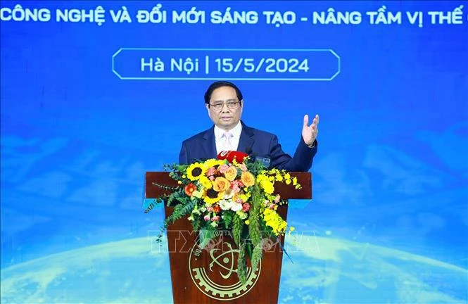 越南政府总理范明政发表讲话。图自越通社