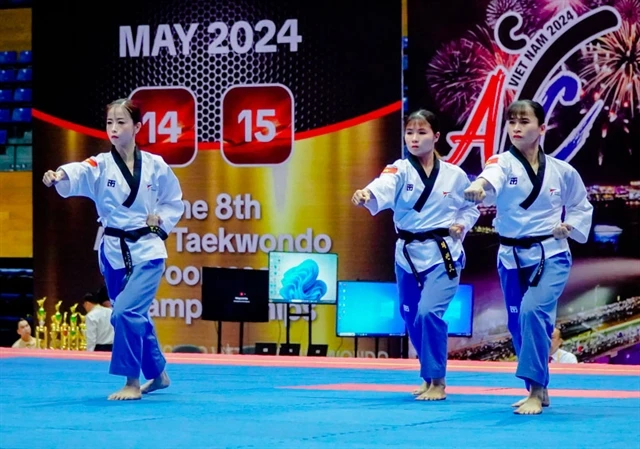 Chau Tuyet Van, Lien Thi Tuyet Mai and Nguyen Thi Le Kim (from left to right) top the podium of the 2024 Asian Taekwondo Championship's women's team T30 recognised poomsae category. (Photo courtesy of Taekwondo Vietnam) 