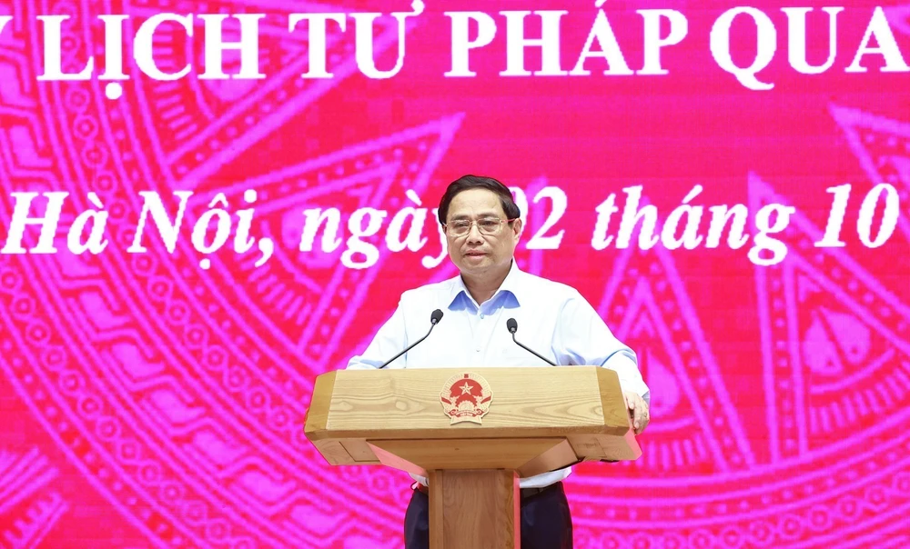 Prime Minister Pham Minh Chinh speaks at the online conference to implement the expansion of the electronic health record system and the issuance of judicial record certificates via the app VNeID nationwide. (Photo: VNA)