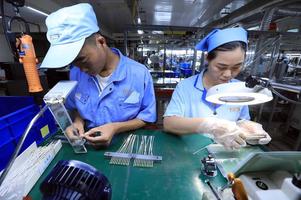 Enterprises invest in technology to increase export value. (Photo: VietnamPlus)