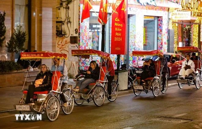 Turistas en Hanoi. (Fuente: VNA)