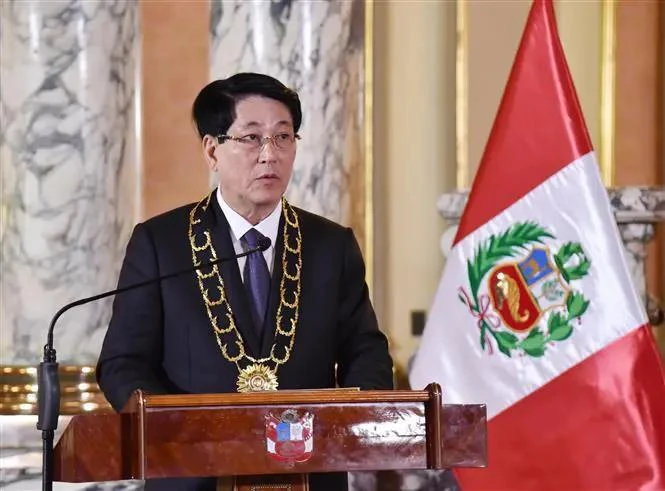 Vietnam’s State President Luong Cuong speaks at the press conference. (Photo: VNA)