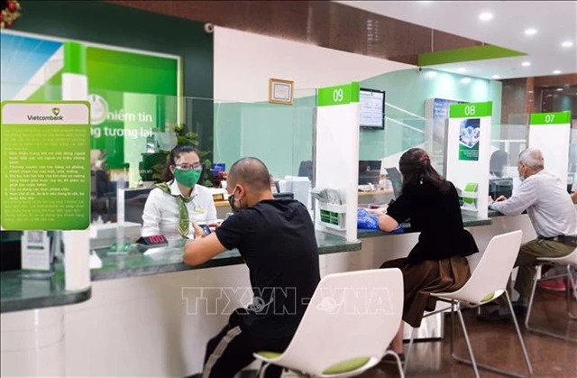 Many commercial banks have adjusted up deposit interest rates. (Photo: VNA)