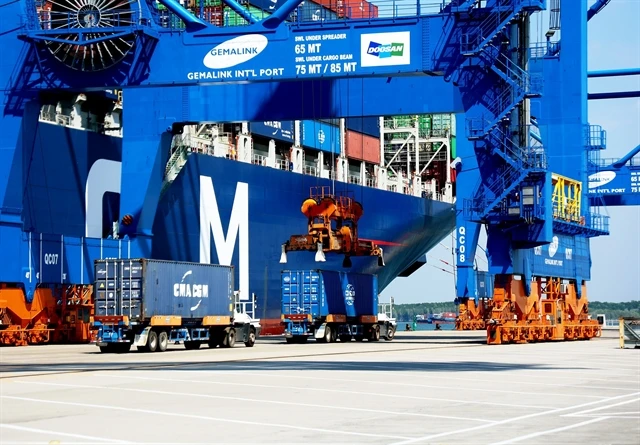 Cargo containers are loaded at Gemalink International Port in Ba Rịa-Vung Tau province. (Photo: VNA)