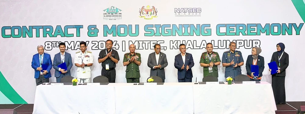 Malaysian Defence Minister Datuk Seri Mohamed Khaled Nordin (center) attends and witness for signing ceremony of Contract Documents, Memorandum of Understanding (MOU), and the handing over of the Letter of Acceptance (LOA), Letter of Intent (LOI) and Corporate Integrity System Malaysia (CISM) Certificate by the Ministry of Defence (MINDEF) in conjunction of Defence Service Asia (DSA) NATSEC Asia 2024 at MITEC, Kuala Lumpur. (Photo: thestar.com.my)