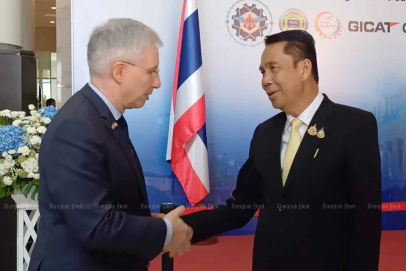 Jean-Claude Poimbœuf, Ambassador of France (L), shakes hands with Thai Defence Minister Sutin Klungsang at the opening of the 'Thailand-France Seminar on Defence Industry 2024' at the Office of the Permanent Secretary for Defence on July 15. (Photo: bangkokpost.com) 