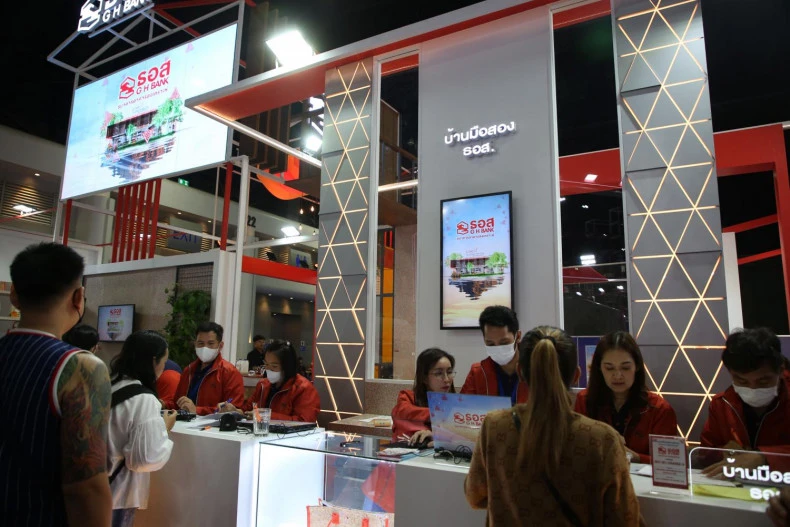 The Government Housing Bank's booth at Money Expo 2024. The bank has been instructed to extend the home loan repayment period up to a maximum age of 85 among borrowers. (Photo:.bangkokpost.com) 