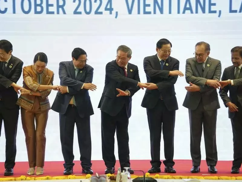 Chinese Premier Li Quiang (centre) arrives in Laos talking up the need for stronger connections with ASEAN. (Photo: AP)