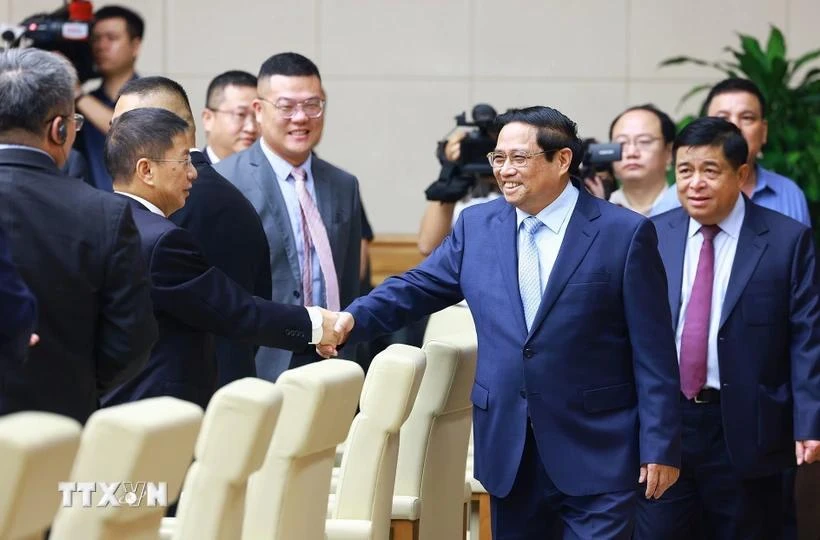 Le Premier ministre Pham Minh Chinh rencontre des entreprises chinoises. Photo: VNA