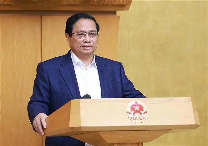 Le Premier ministre Pham Minh Chinh à la conférence gouvernementale sur le dressement du bilan de la mise en œuvre de la Résolution n° 18-NQ/TW. Photo: VNA