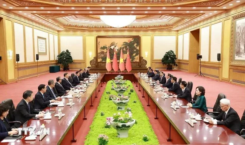 During his stay in China, PM Pham Minh Chinh meets with General Secretary of the Communist Party of China and President of China Xi Jinping in Beijing on June 26. (Photo: VNA)