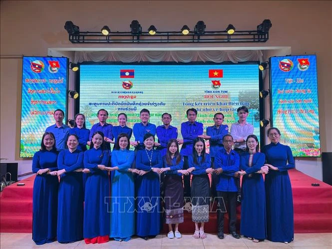 Vietnamese and Lao delegates to the conference held in Kon Tum province on December 6 (Photo: VNA)