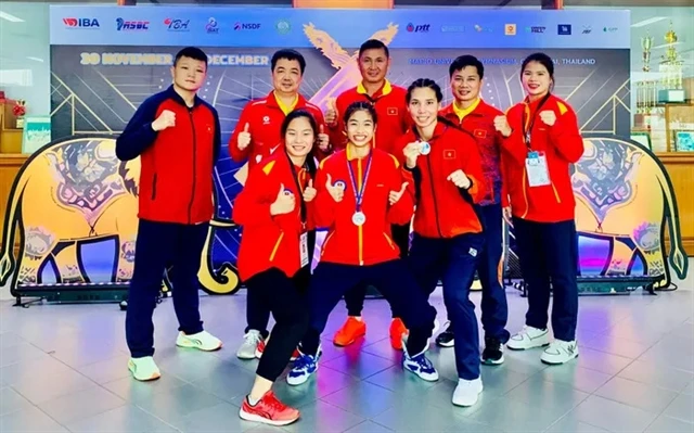 Vietnamese boxers and coaches pose with their medals of the Asian Amateur Boxing Championships 2024. (Photo: VNA) 