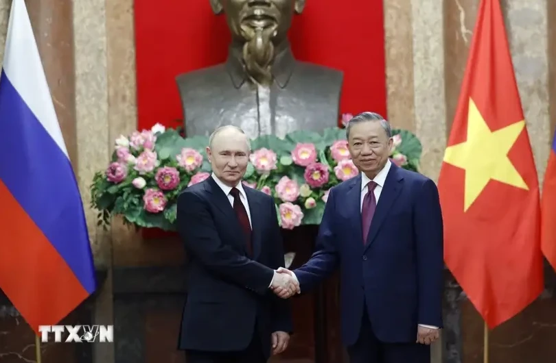 越南国家主席苏林和俄罗斯总统普京。图自越通社