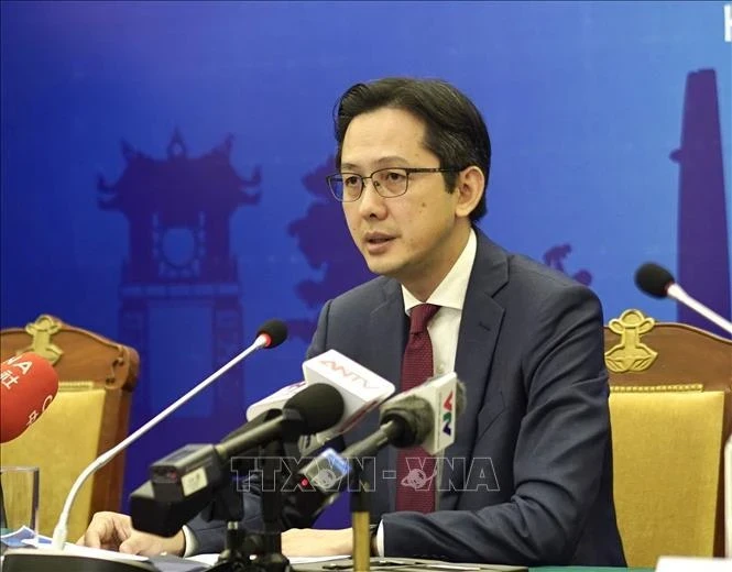 Заместитель министра иностранных дел До Хунг Вьет ведет пресс-конференцию, на которой объявляется национальный доклад Вьетнама о защите и поощрении прав человека (Фото: ВИА) 