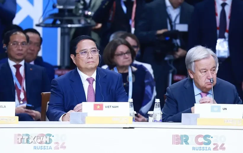 El primer ministro de Vietnam, Pham Minh Chinh, participa en la Cumbre del grupo ampliado de los BRICS (Fuente: VNA)