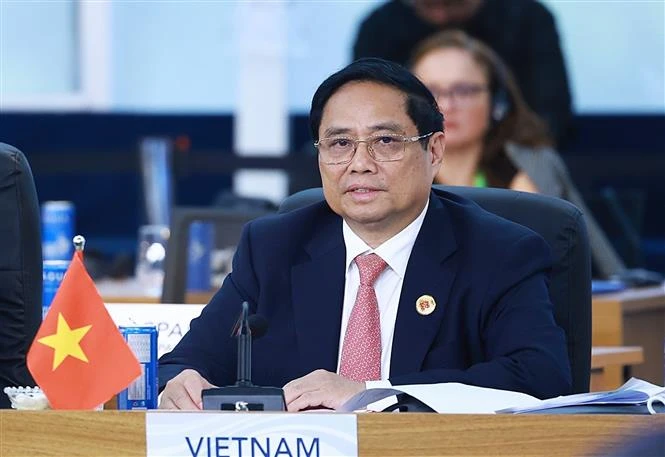 El primer ministro de Vietnam, Pham Minh Chinh, presentó un discurso durante un debate sobre desarrollo sostenible y transición energética en el marco de la Cumbre del G20 en Rio de Janeiro, Brasil (Fuente: VNA)