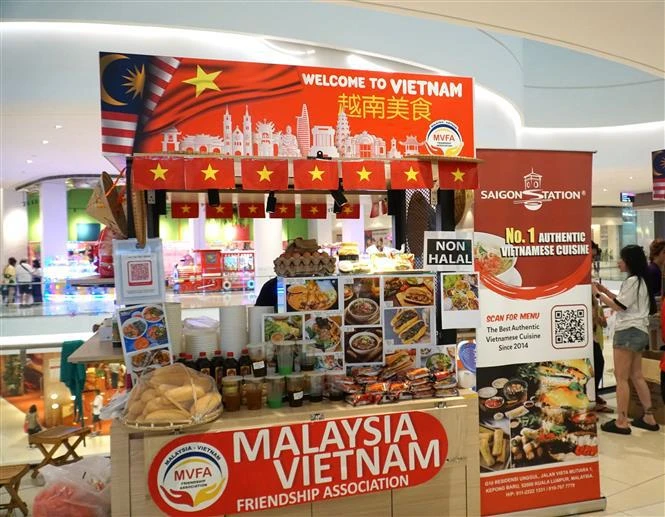 Un stand présentant les plats pho de l'entreprise Sai Gon Station. Photo : VNA