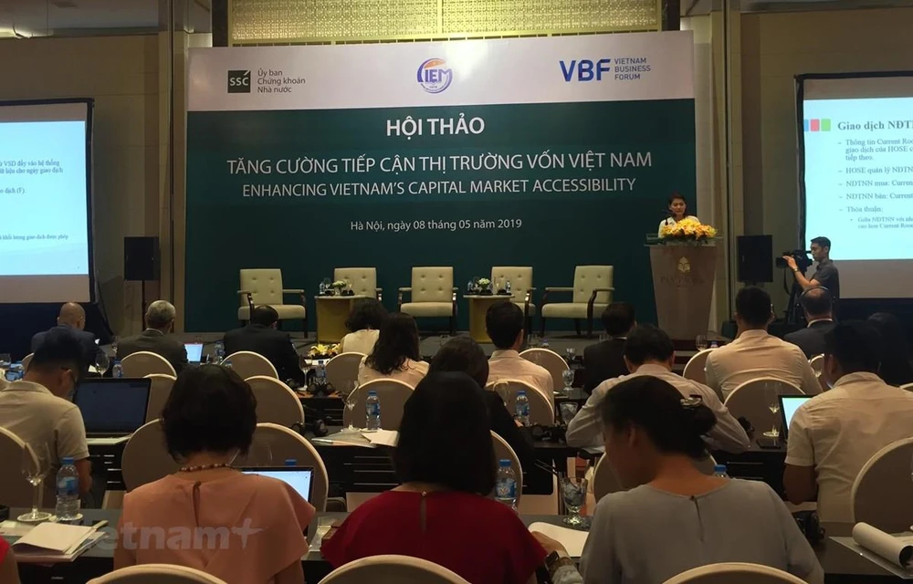 Conference on “Enhancing Vietnam’s Capital Market Accessibility” in Hanoi on May 8 (Photo: VietnamPlus)