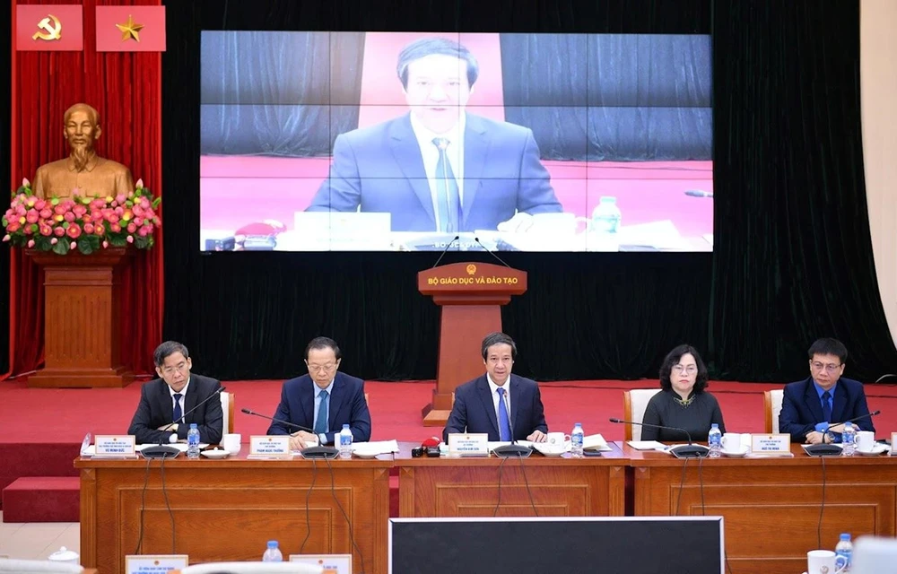 Minister of Education and Training Nguyen Kim Son at a meeting held in both in-person and online formats with 700,000 teachers, administrators and school staff nationwide (Photo: VietnamPlus)