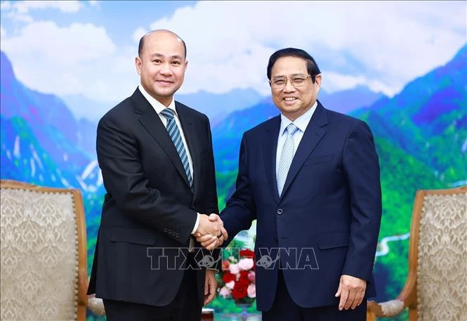 Prime Minister Pham Minh Chinh (right) and Hun Many, who is a member of the Cambodian People’s Party (CPP) Standing Committee, Secretary-General of the CPP Central Committee’s Mass Movement Commission, Deputy PM, Minister of Civil Service of Cambodia (Photo: VNA)