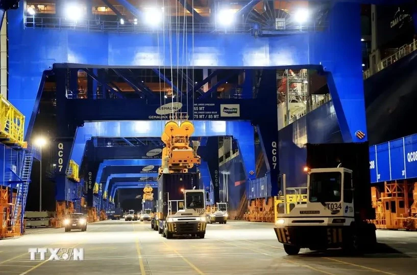 Transporting import and export containers at Gemalink International Port in Phu My town, Ba Ria-Vung Tau province (Photo: VNA)