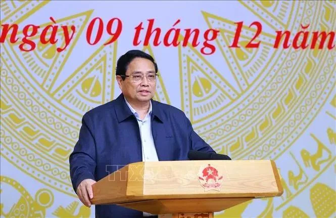 Prime Minister Pham Minh Chinh, who is also Chairman of the Central Emulation and Commendation Council, chairs its 10th meeting Hanoi on December 9. (Photo: VNA)