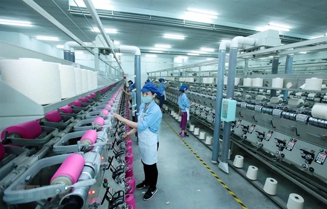 Production lines of Jasan Textile and Dyeing Vietnam. (Photo: VNA) 